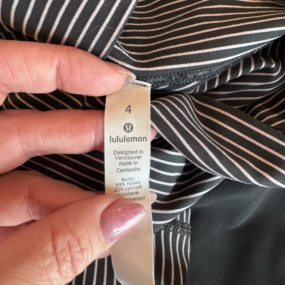 2 Lululemon High-Rise Leggings. 1 striped and 1 black - Picture 2 of 4